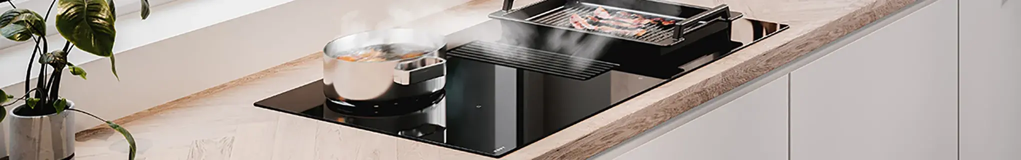 Novy Easy Pro Recirculation 4-Zone Vented Induction Hob in luxury kitchen 