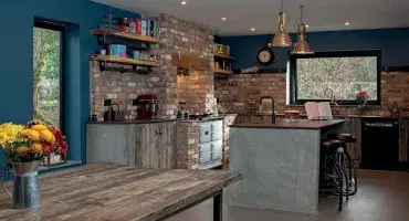 Rural theme kitchen featuring an AGA cooker 