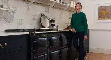 Hatta Byng Standing in front of AGA 