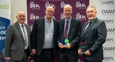 Carl Moon and David Carpenter receiving the UKIFDA innovation award