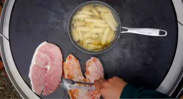 Gammon and chips cooking on the AGA Outdoor Grill