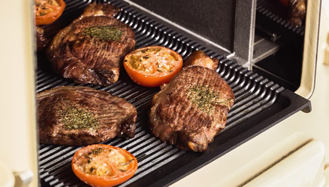 Steaks grilling in the AGA roasting oven