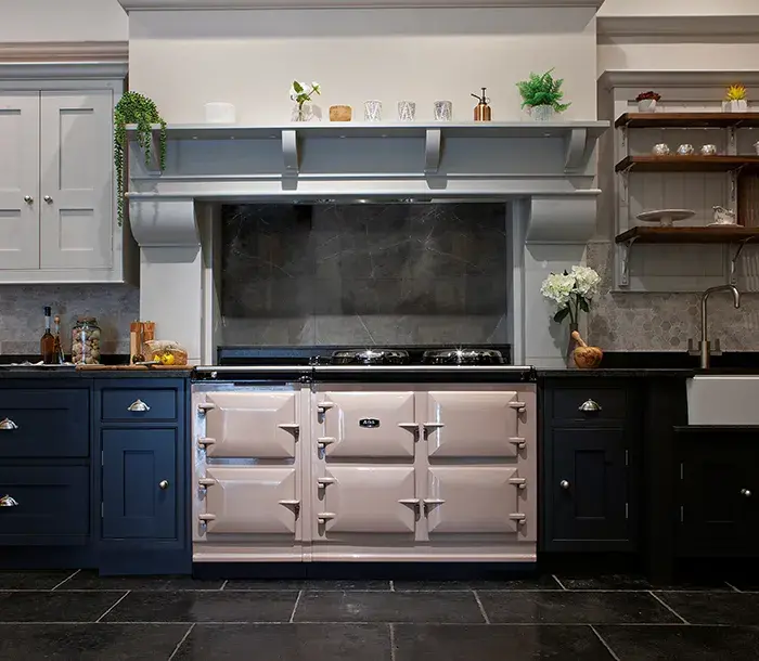 AGA eR7 150 in Blush against blue cabinets 
