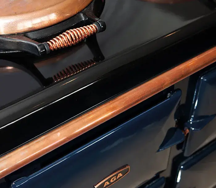 Copper handrail and dome lid of Taylor Howes AGA