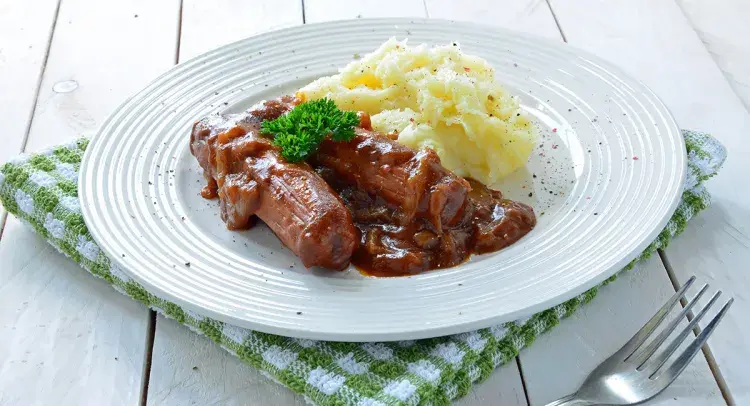 Sausages and Mash in Onion Gravy