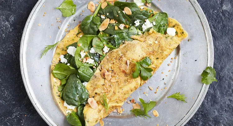 Mixed herb omelette with spinach, feta & dukkah