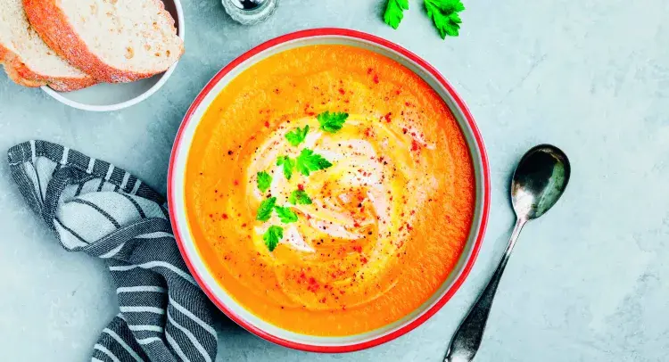 Sweet Potato and Butternut Squash Soup served in a bowl